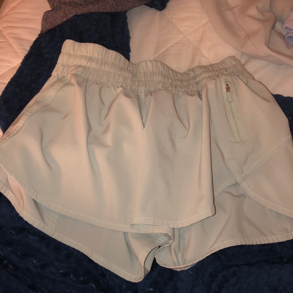 Light Green lululemon tracker shorts 4 inch